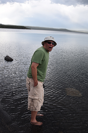 Ray freezing while standing in Yellowstone Lake at Yellowstone National Park